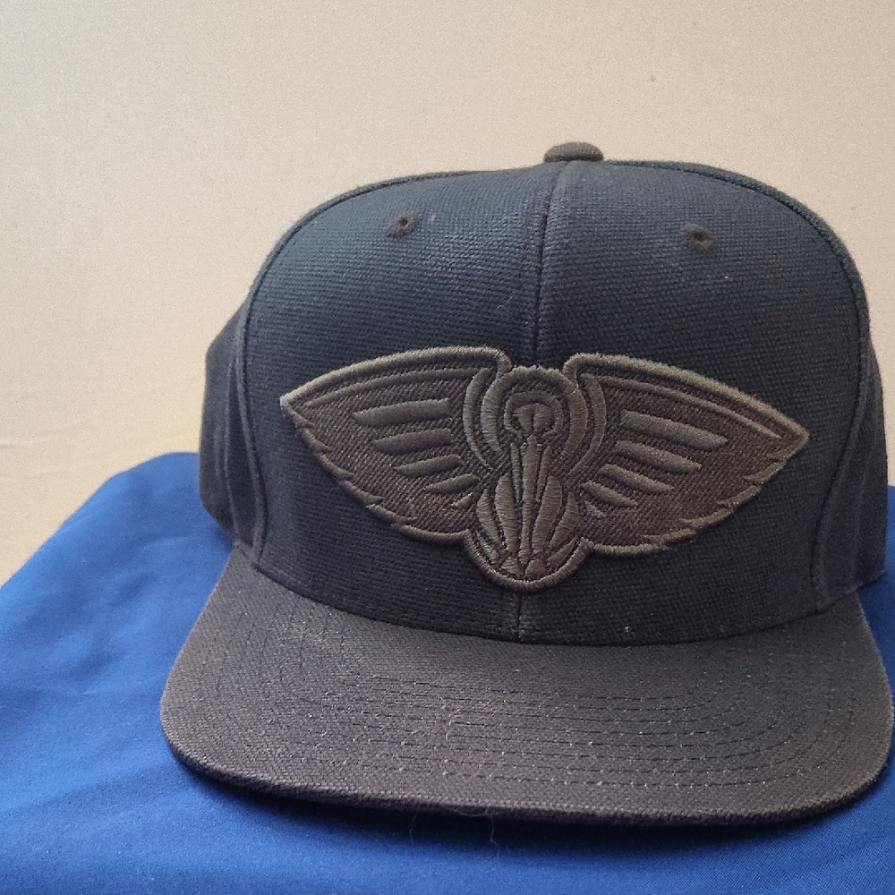 Black Cap with Embroidered Winged Logo